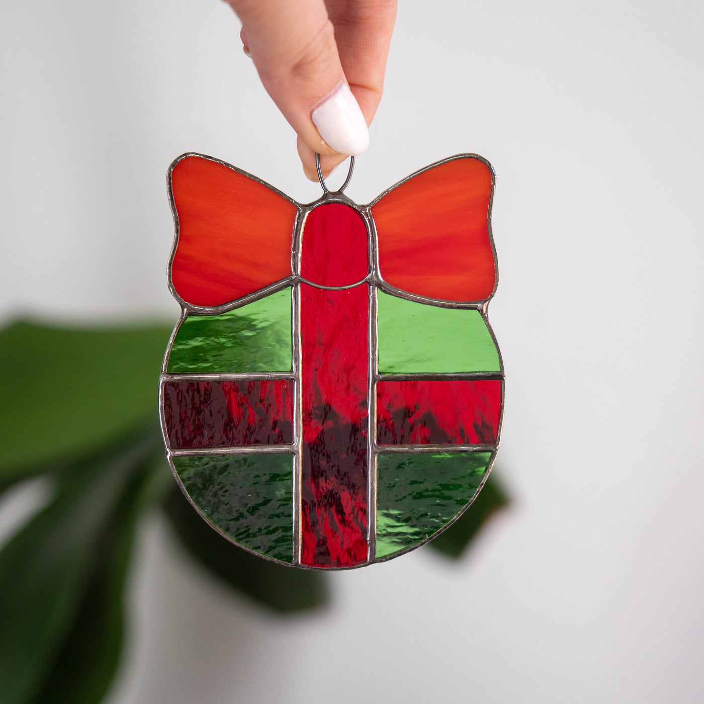 Stained glass round green gift with red bow window hanging 