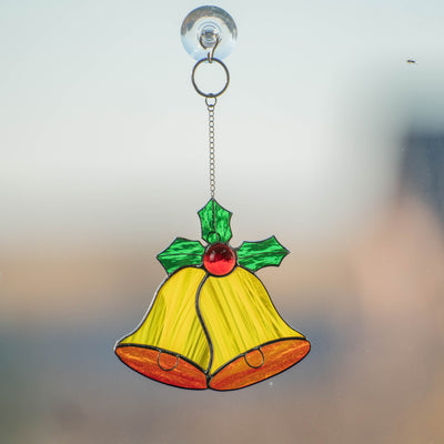 Yellow christmas bells suncatcher of stained glass
