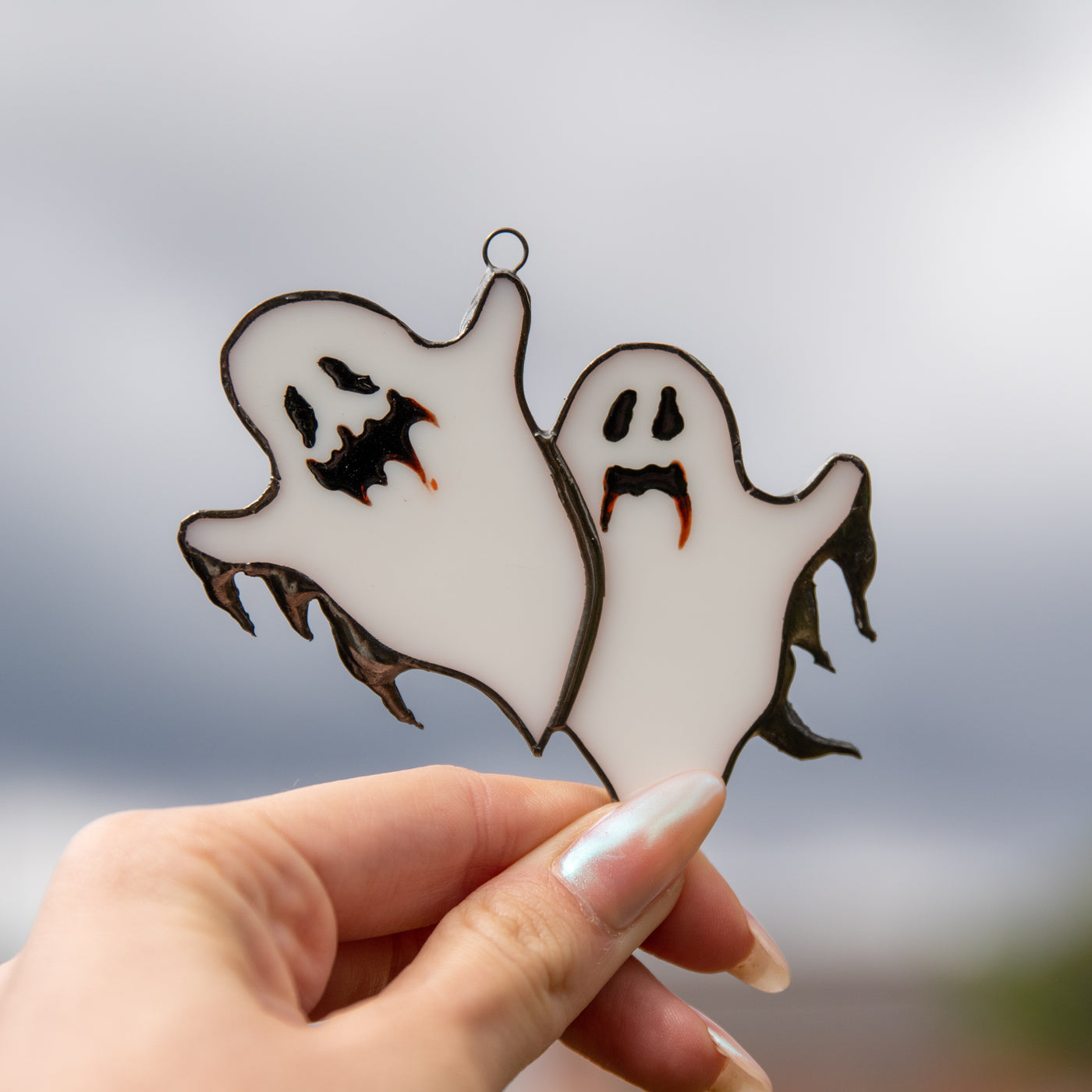 Stained glass pair of Halloween ghosts suncatcher
