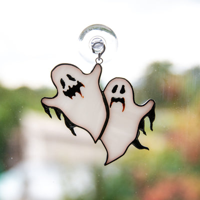 Halloween suncatcher of stained glass ghosts 