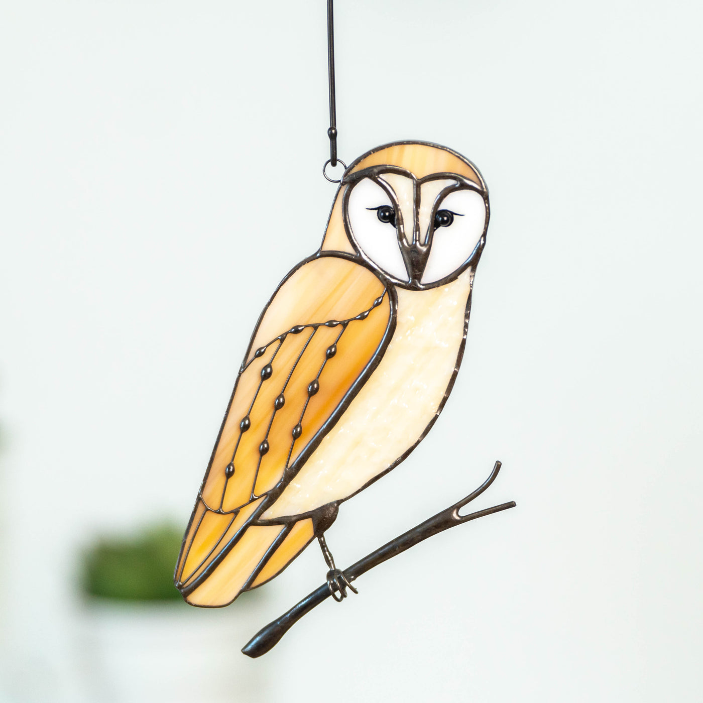 Stained glass barrel owl on the branch window hanging 