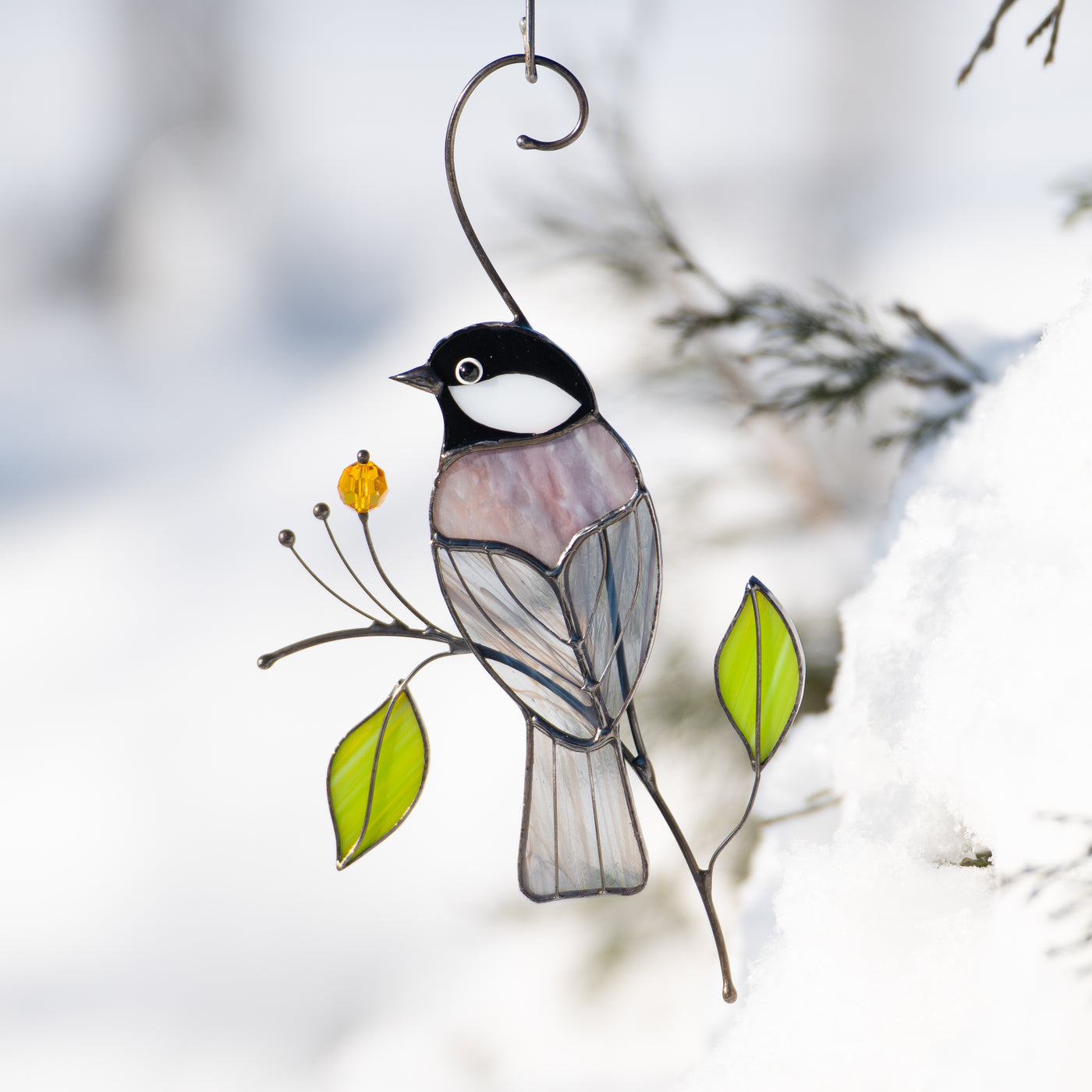 Stained glass window hanging of a back-view chickadee