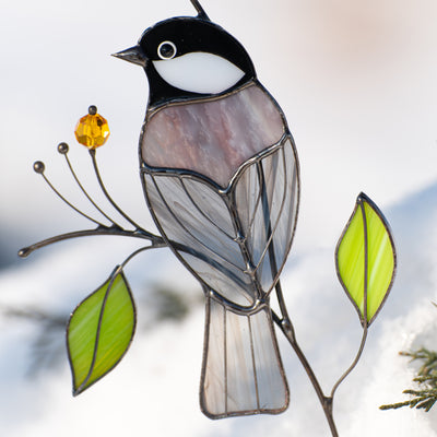 Zoomed stained glass chickadee