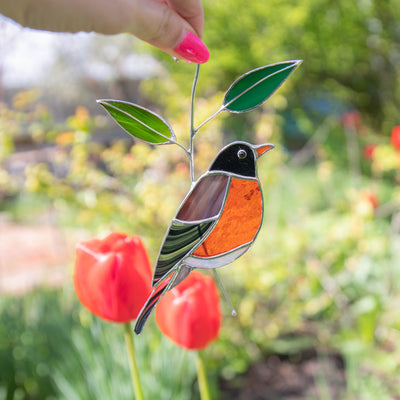 Stained glass suncatcher of American robin bird