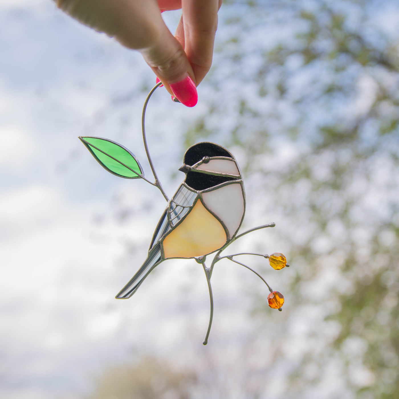Chickadee with leaf and berries window hanging of stained glass