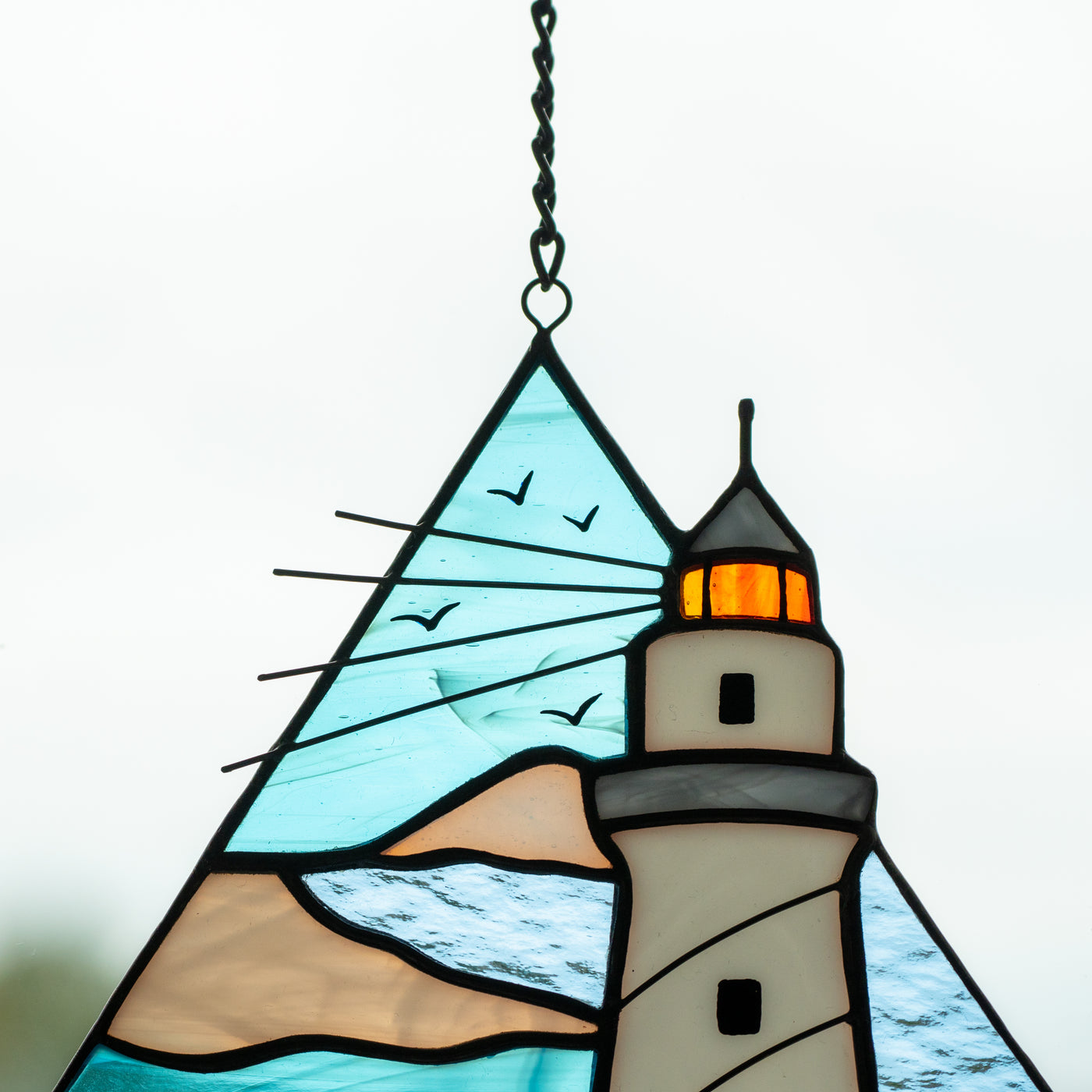 Zoomed stained glass lighthouse