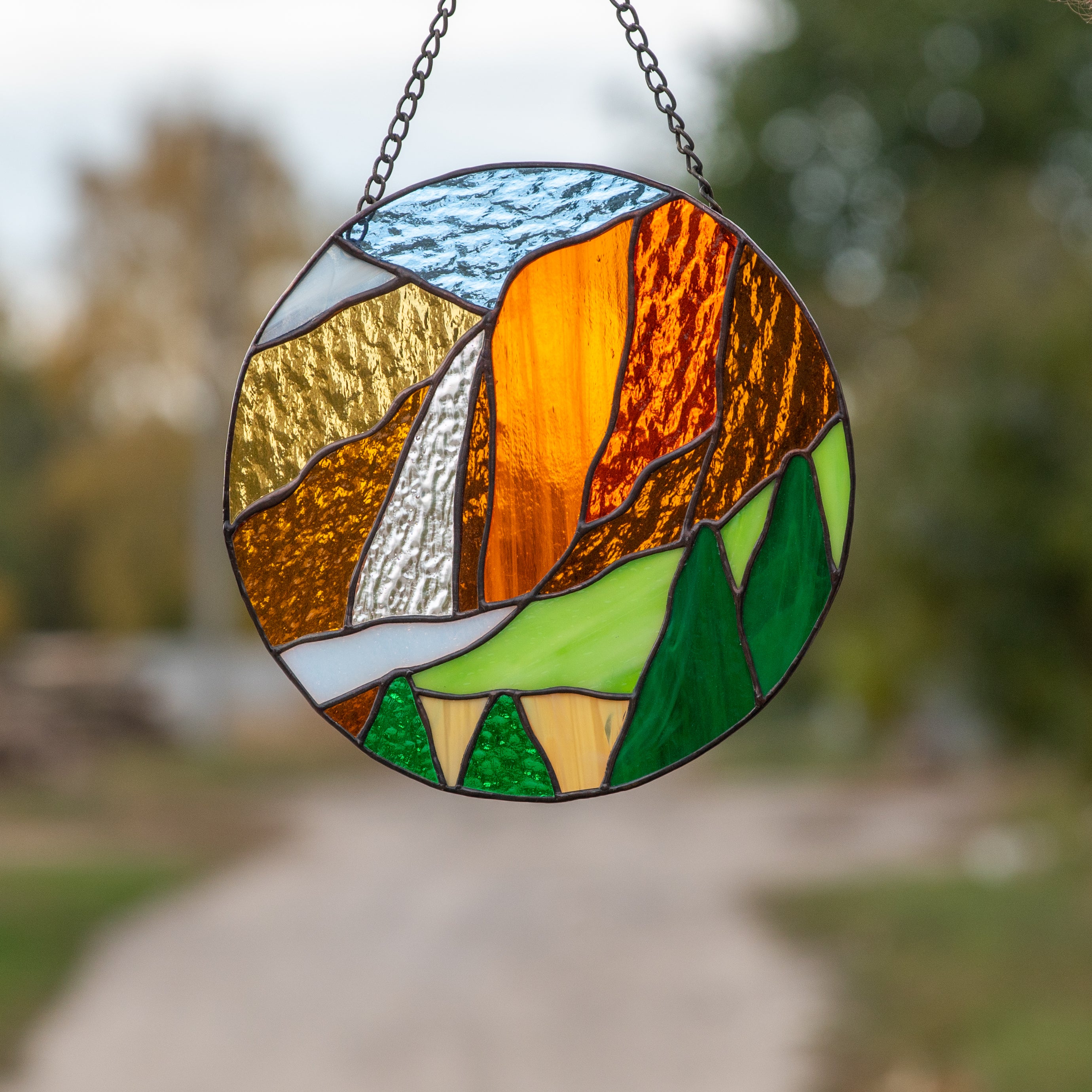 Colourful stained glass panel depicting Yosemite National park