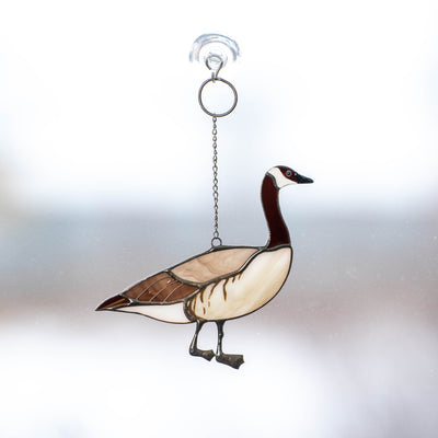 Stained glass window hanging of a Canadian goose