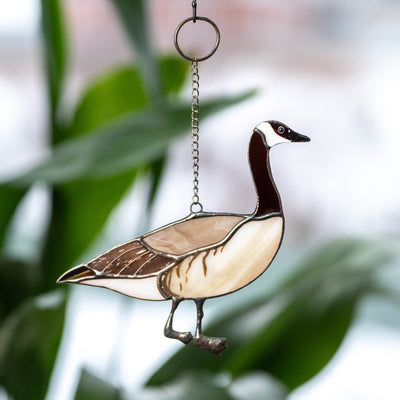 Stained glass suncatcher of a Canadian goose looking right