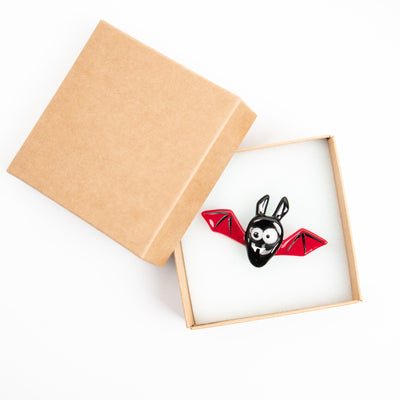 Stained glass halloween red bat pin in a brand box