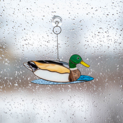 Stained glass looking right swimming duck window hanging 