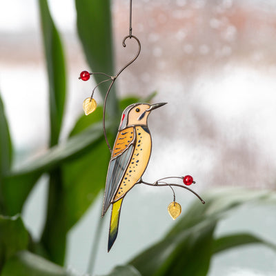 Stained glass Northern Flicker sitting on the branch suncatcher for window