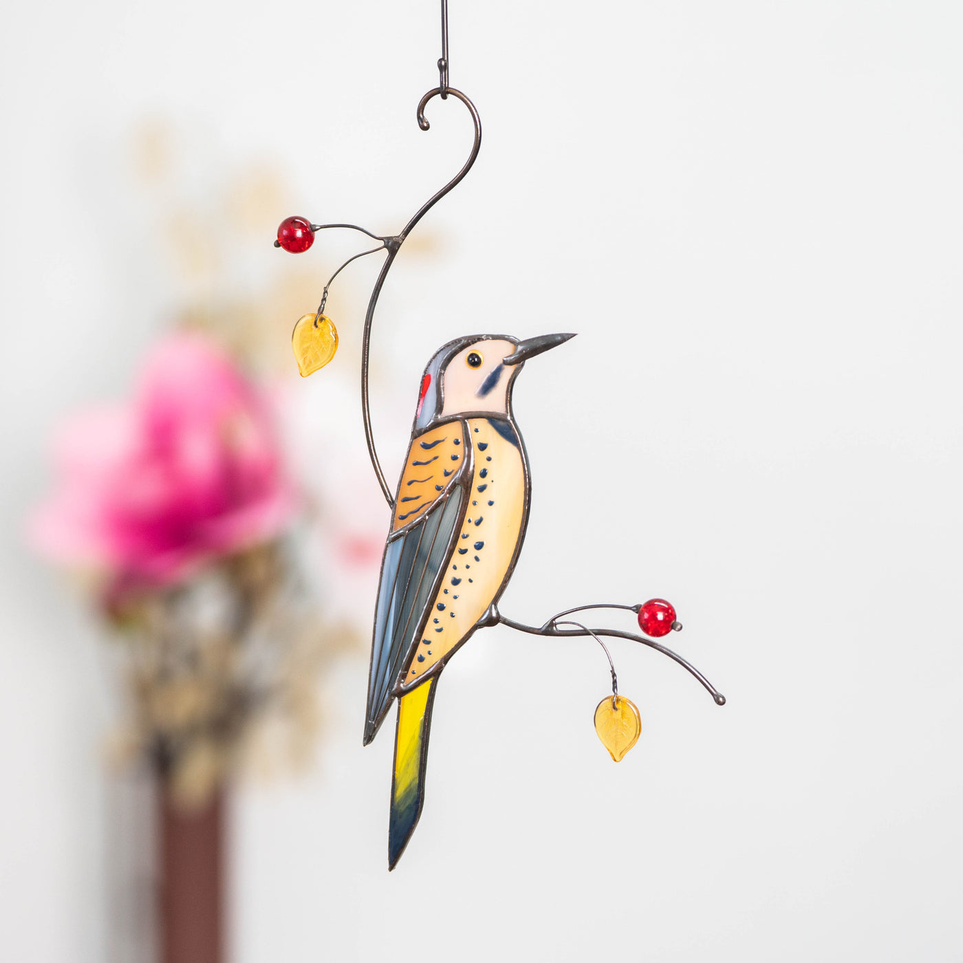 Stained glass Northern Flicker sitting on the branch with leaves and berries suncatcher 