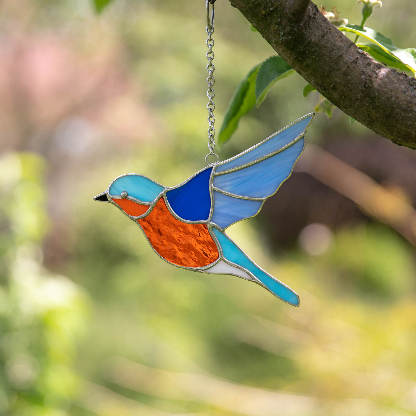 Bright stained glass flying bluebird suncatcher for home decor