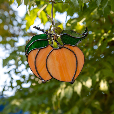 Stained glass suncatcher of two peaches