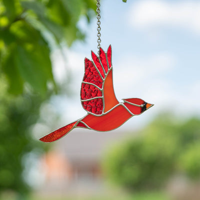 Stained glass flying male cardinal window hanging 