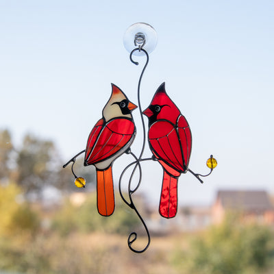 Stained glass cardinals couple on the branch with leaves and berries suncatcher 