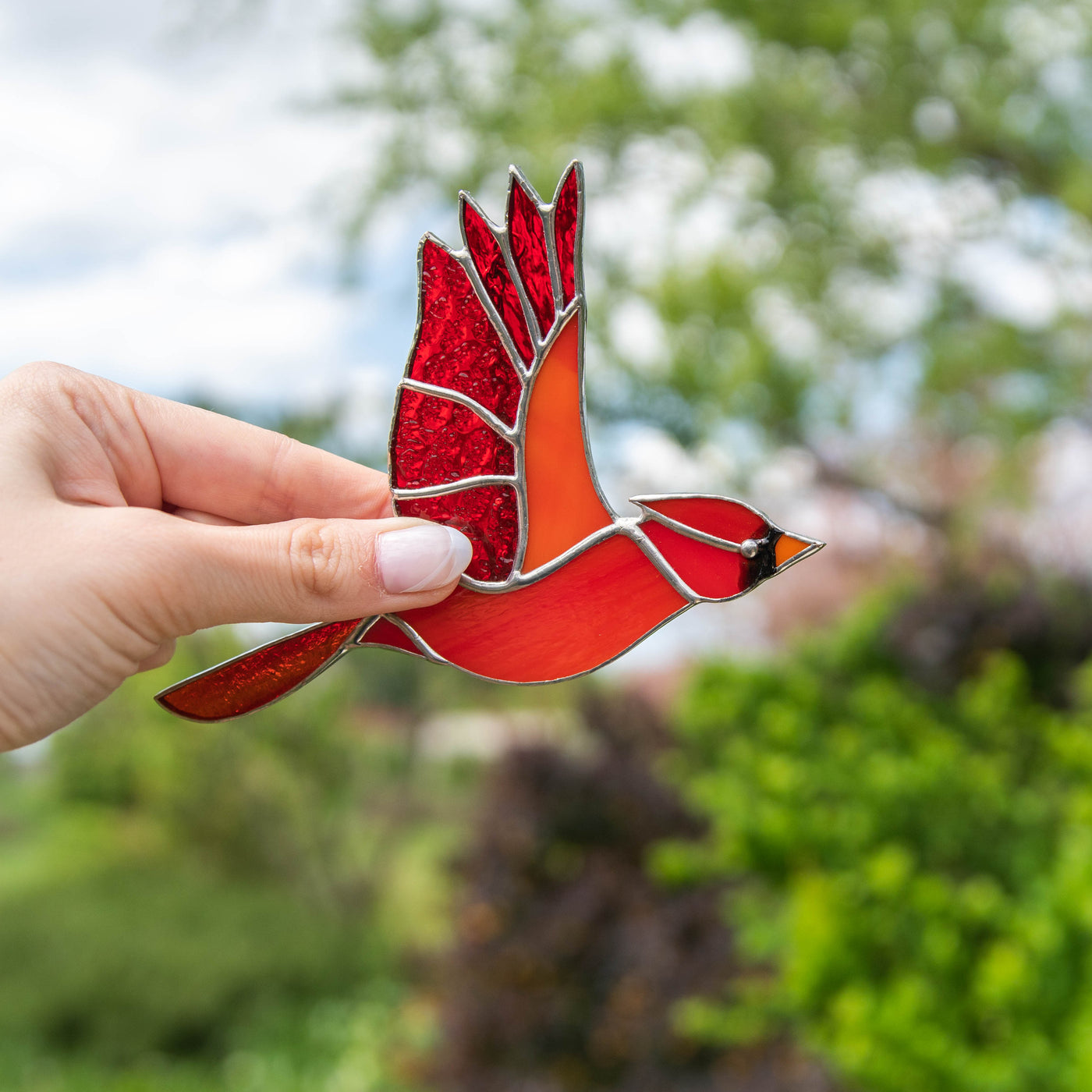Stained glass flying male red bird suncatcher