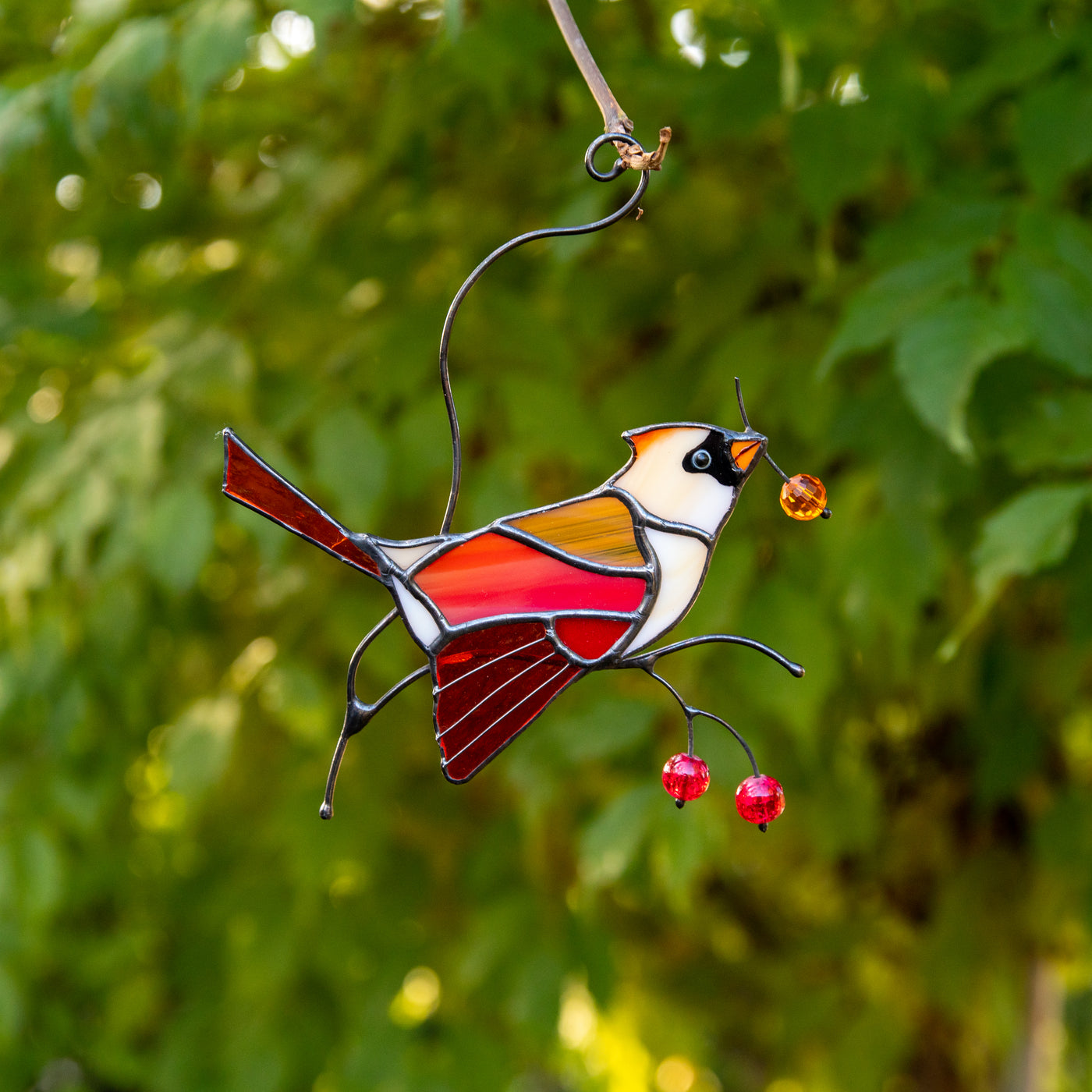 Colourful female cardinal suncatcher of stained glass for home decor