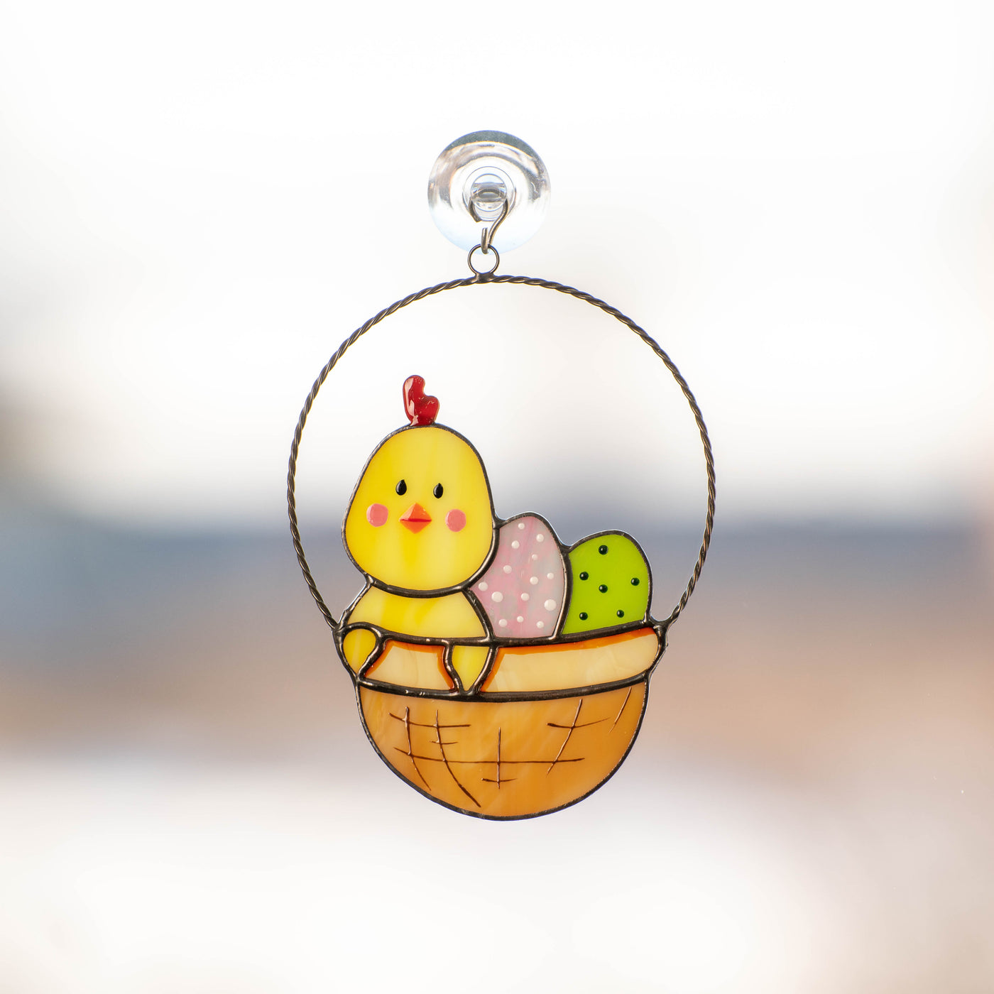 Chick with eggs in a basket suncatcher of stained glass