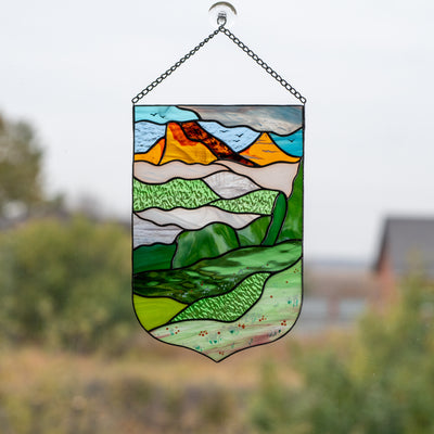 Stained glass panel depicting Estes Park for home decor