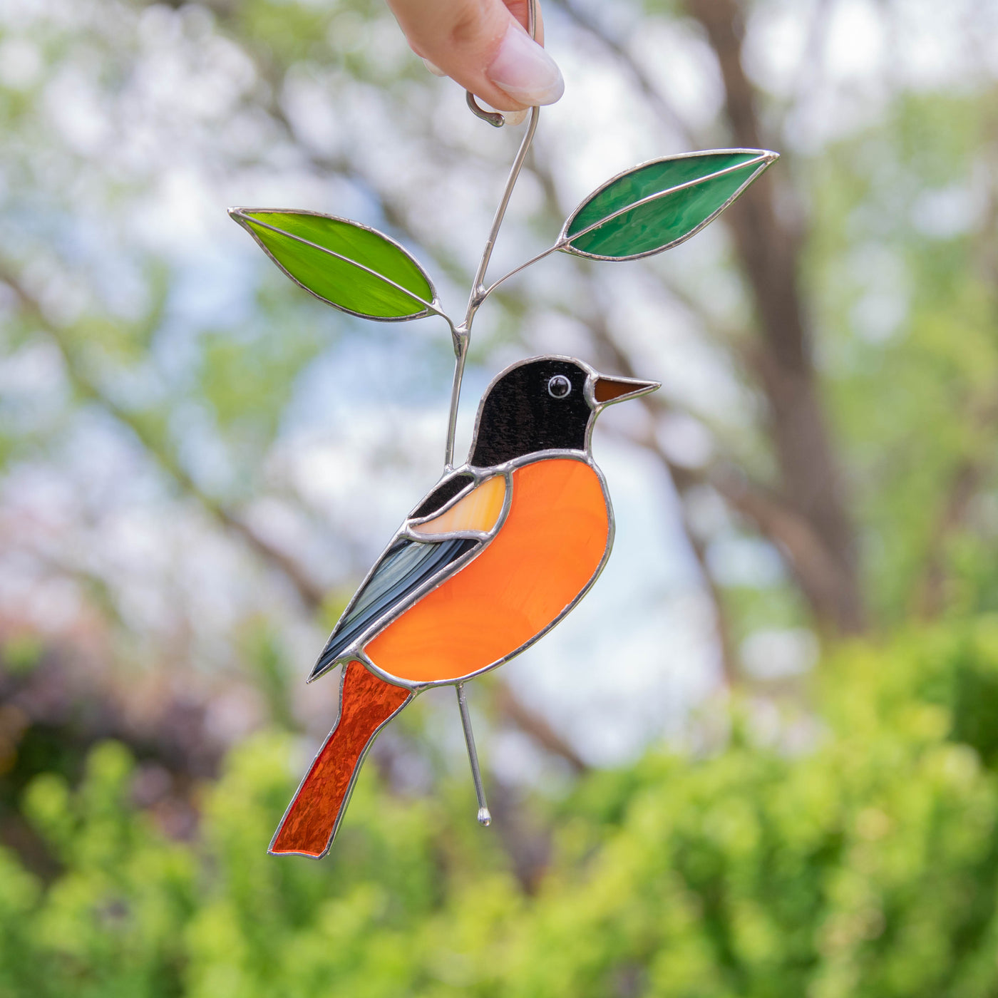 Stained glass Baltimore Oriole bird suncatcher
