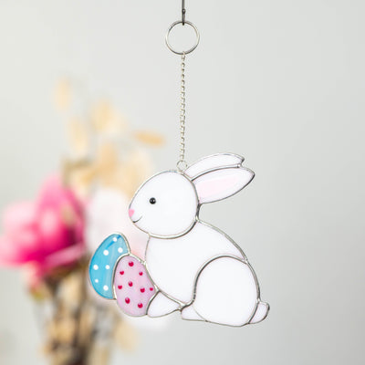 Easter bunny with pink and blue eggs suncatcher of stained glass