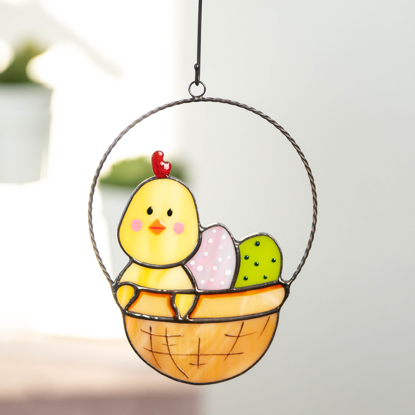 Easter chick with eggs in a basket window hanging of stained glass