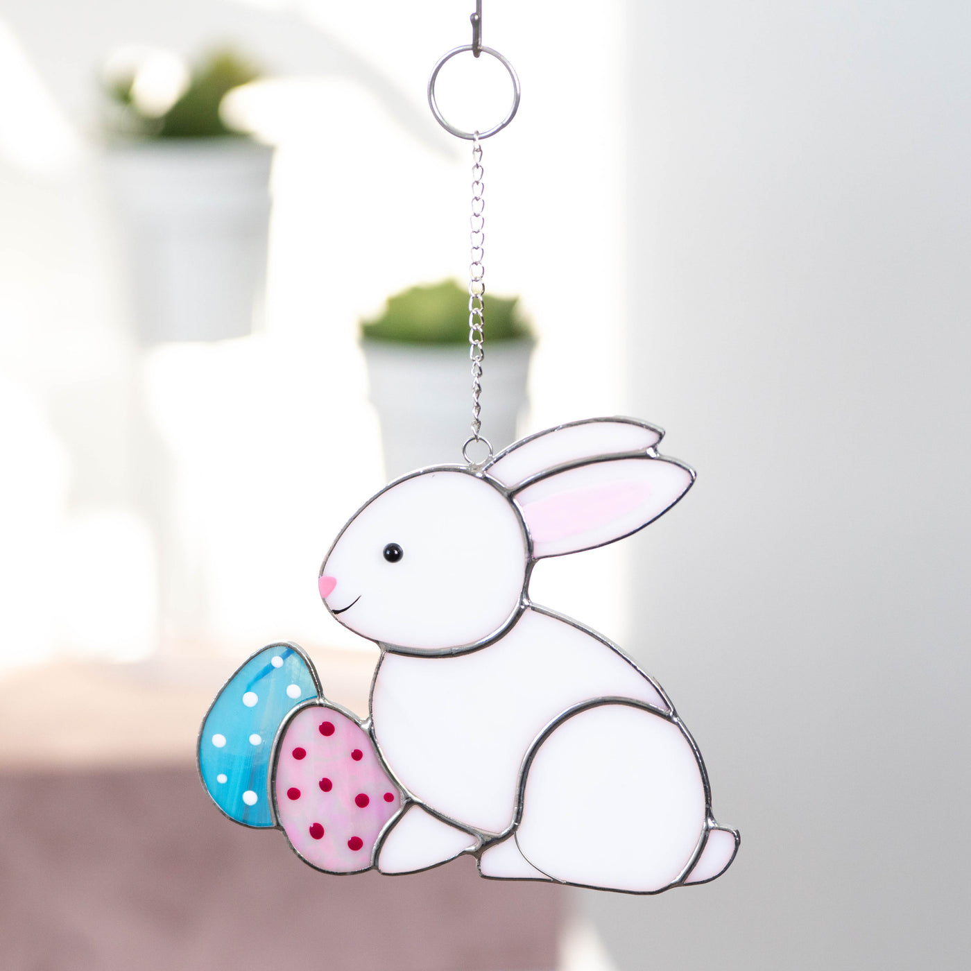 Stained glass Easter bunny with pink and blue eggs suncatcher