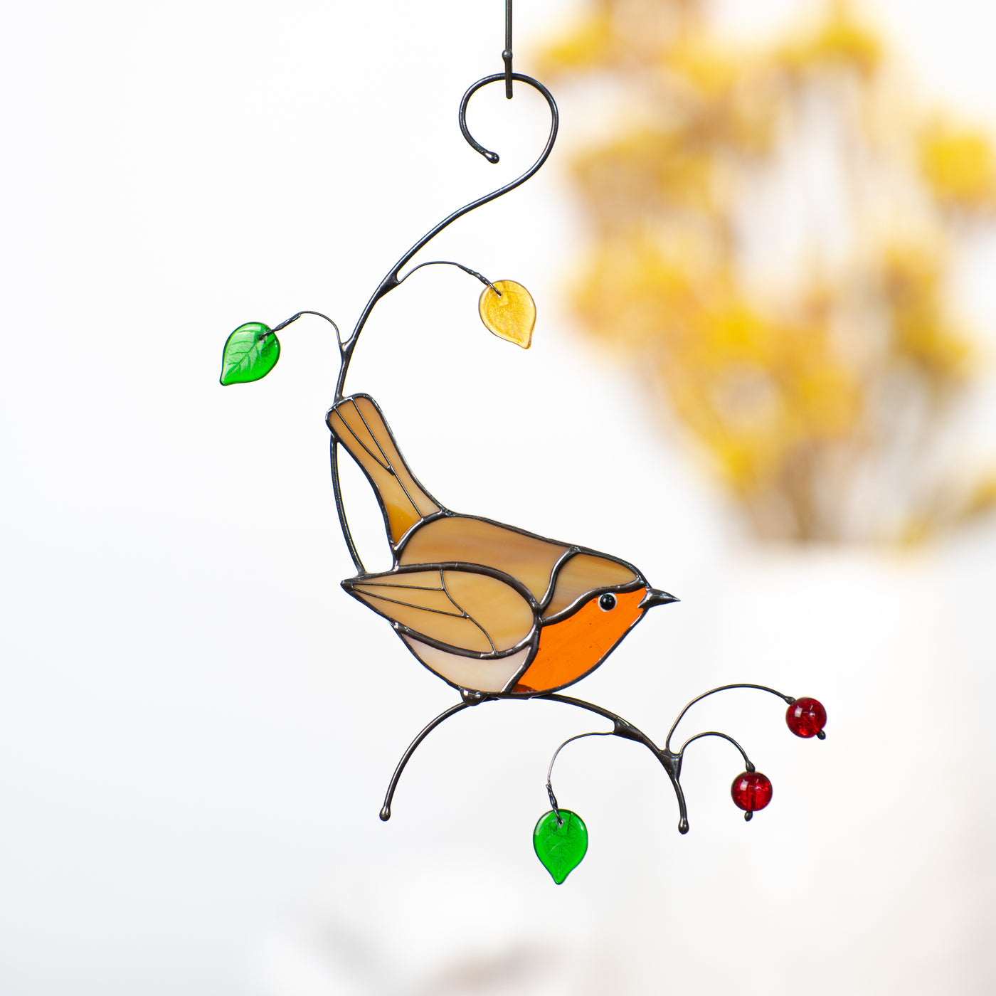 Stained glass robin bird sitting on the branch with leaves and berries suncatcher