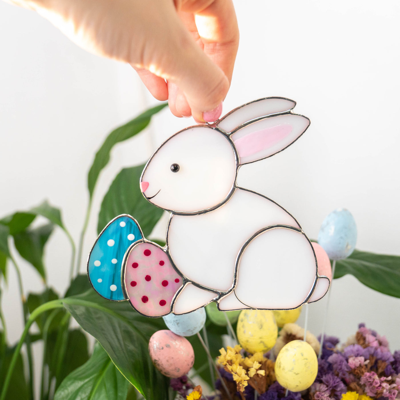 Stained glass bunny with pink and blue eggs suncatcher for Easter