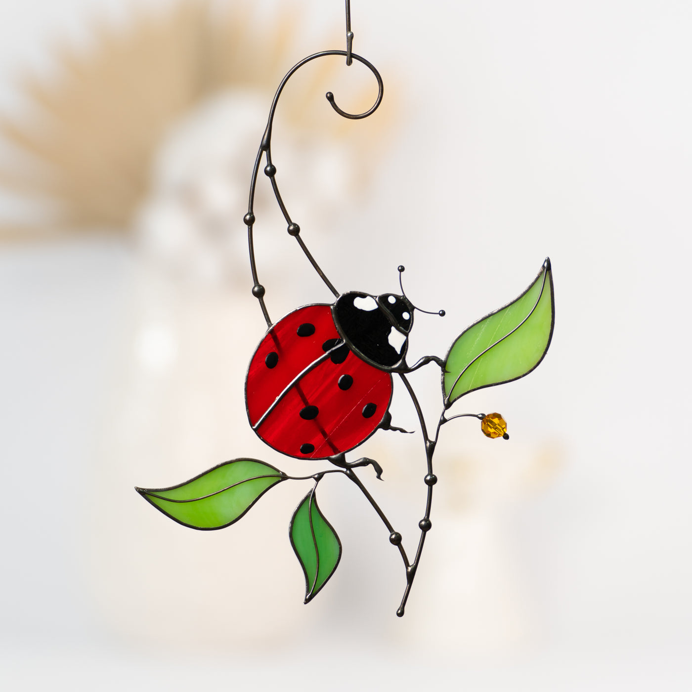 Stained glass ladybug with leaves suncatcher