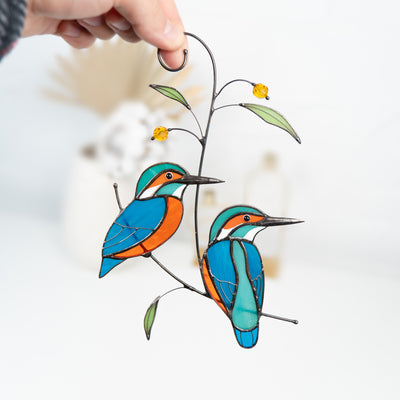 Two kingfishers sitting one the branch suncatcher of stained glass