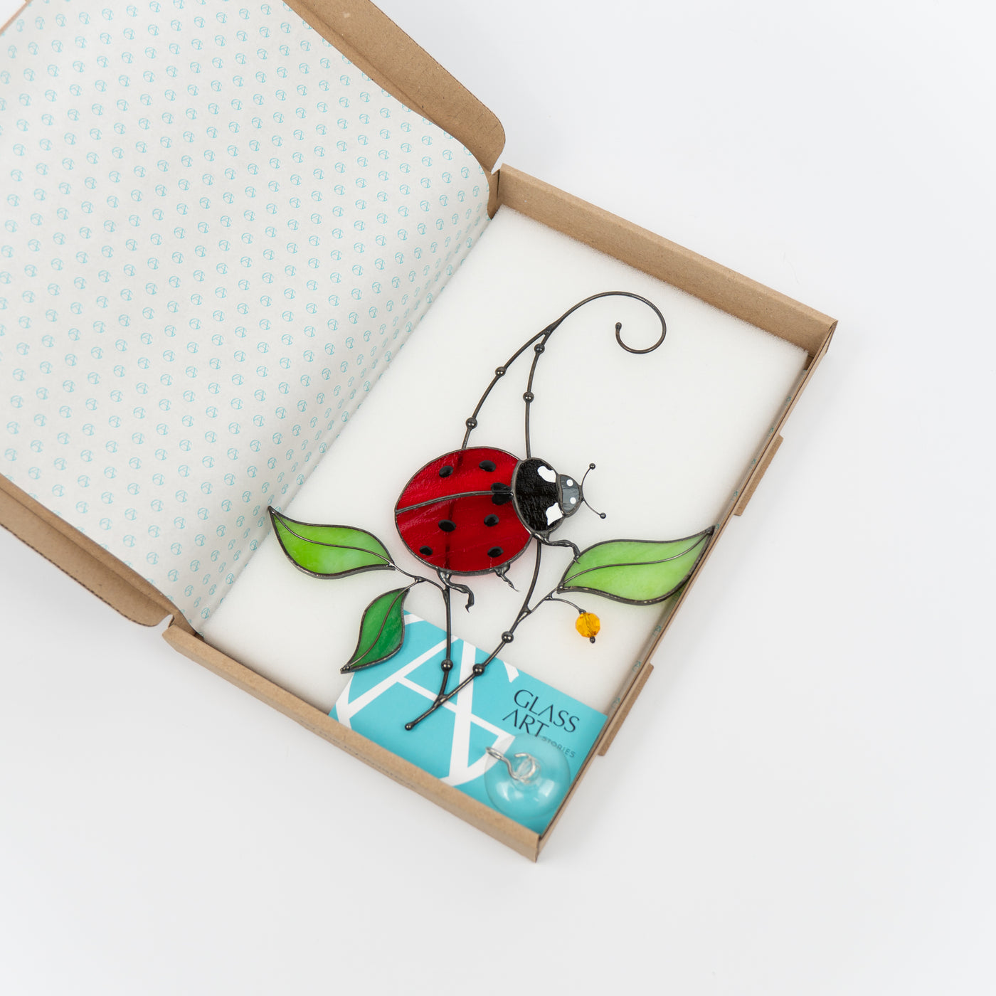 Ladybug stained glass suncatcher in a brand box