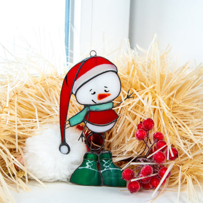 Stained glass snowman wearing green boots suncatcher for Christmas decor