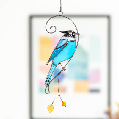 Steller's Jay on the branch suncatcher of stained glass