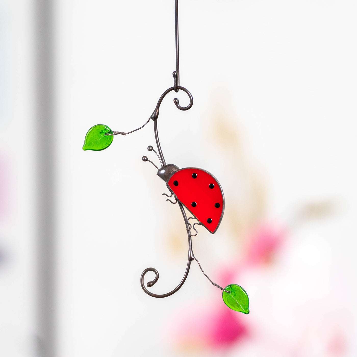 Sideview stained glass ladybug window hanging 