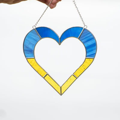Stained glass heart suncatcher of blue and yellow colors
