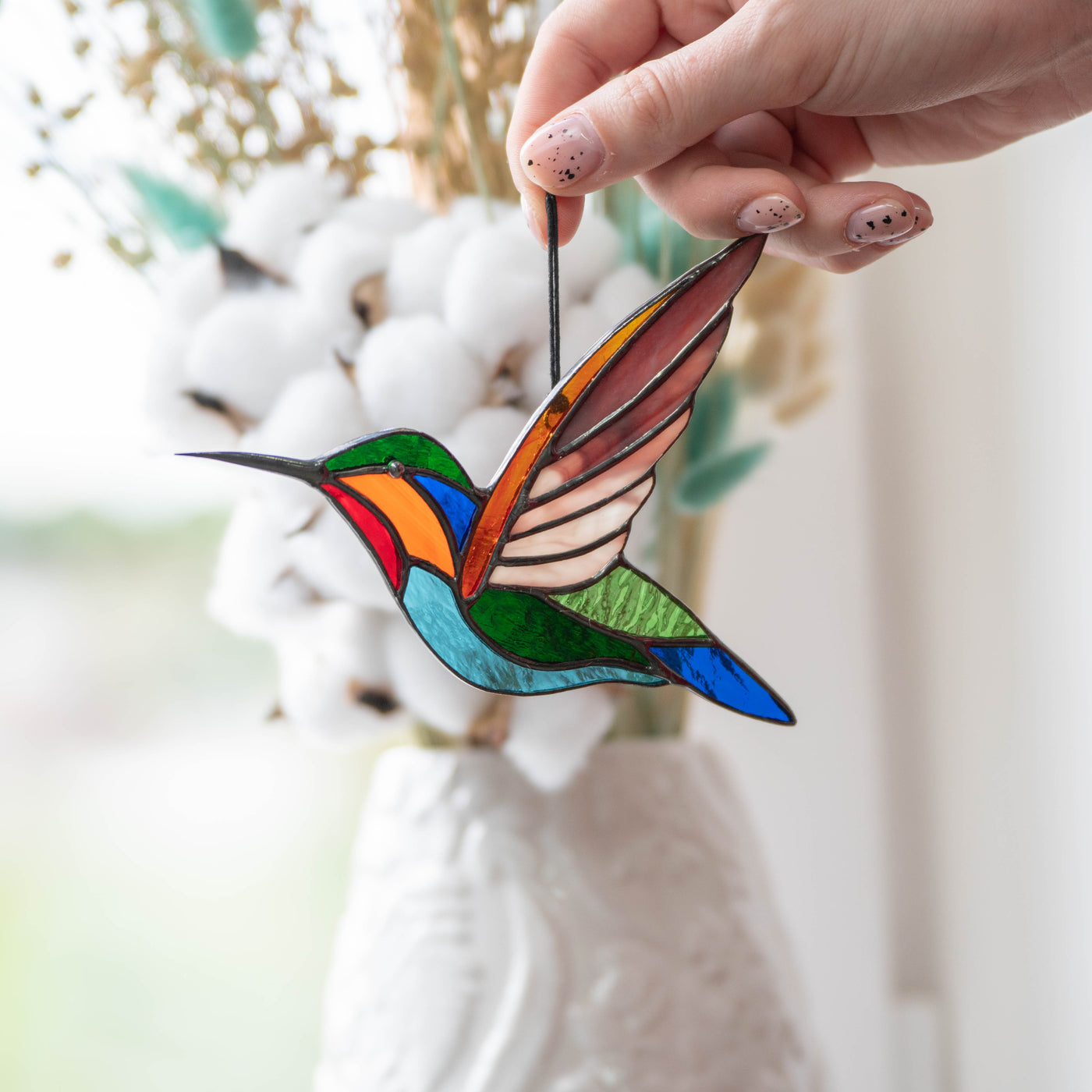 Flying hummingbird window hanging of stained glass