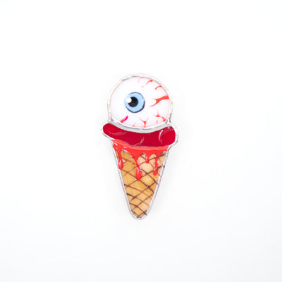 Stained glass ice-cream with the torn out eye brooch for Halloween