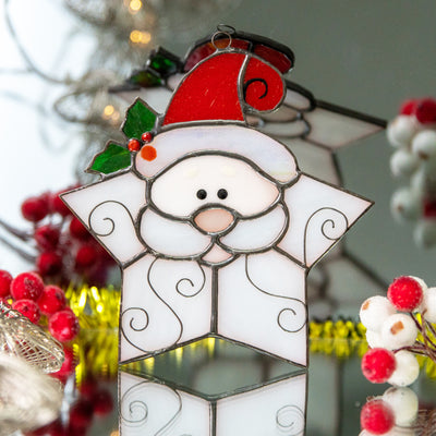 Adorable stained glass Santa shaped as snowflake suncatcher for Christmas