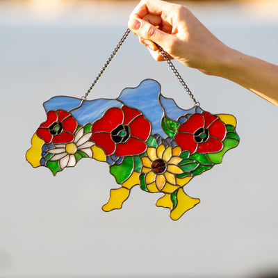 Ukrainian map with flowers inside of it window hanging of stained glass