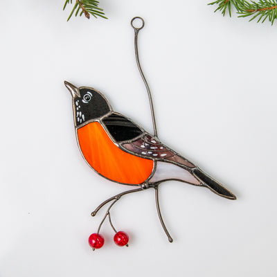 Stained glass American robin bird sitting on the branch suncatcher