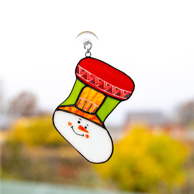 Stained glass Christmas stocking depicting snowman's face window hanging