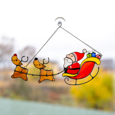 Santa's reindeer team window hanging of stained glass