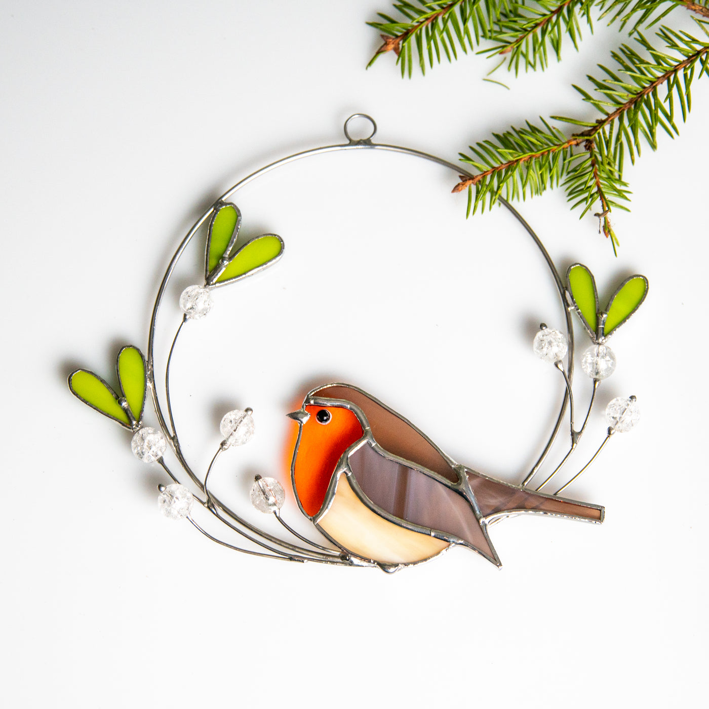 Stained glass robin on the mistletoe suncatcher for Christmas decor