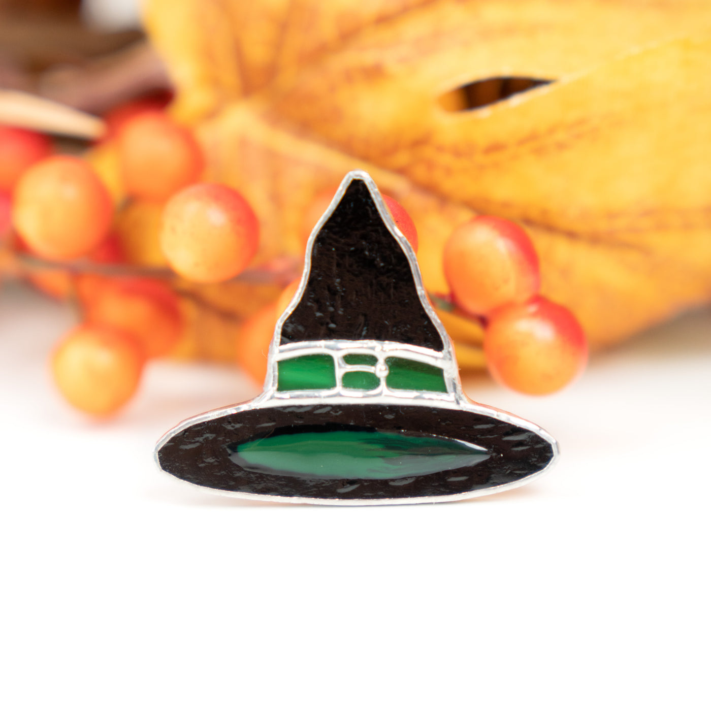 Zoomed Halloween witch hat brooch of stained glass