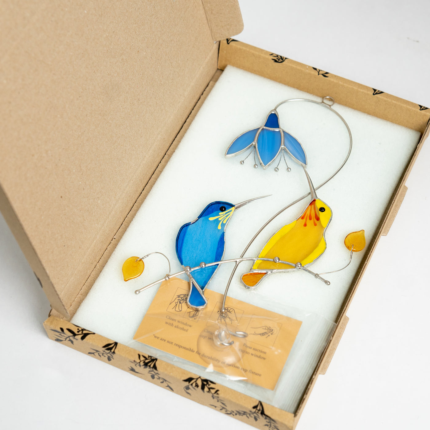 Stained glass couple of Ukrainian hummingbirds in the brand box