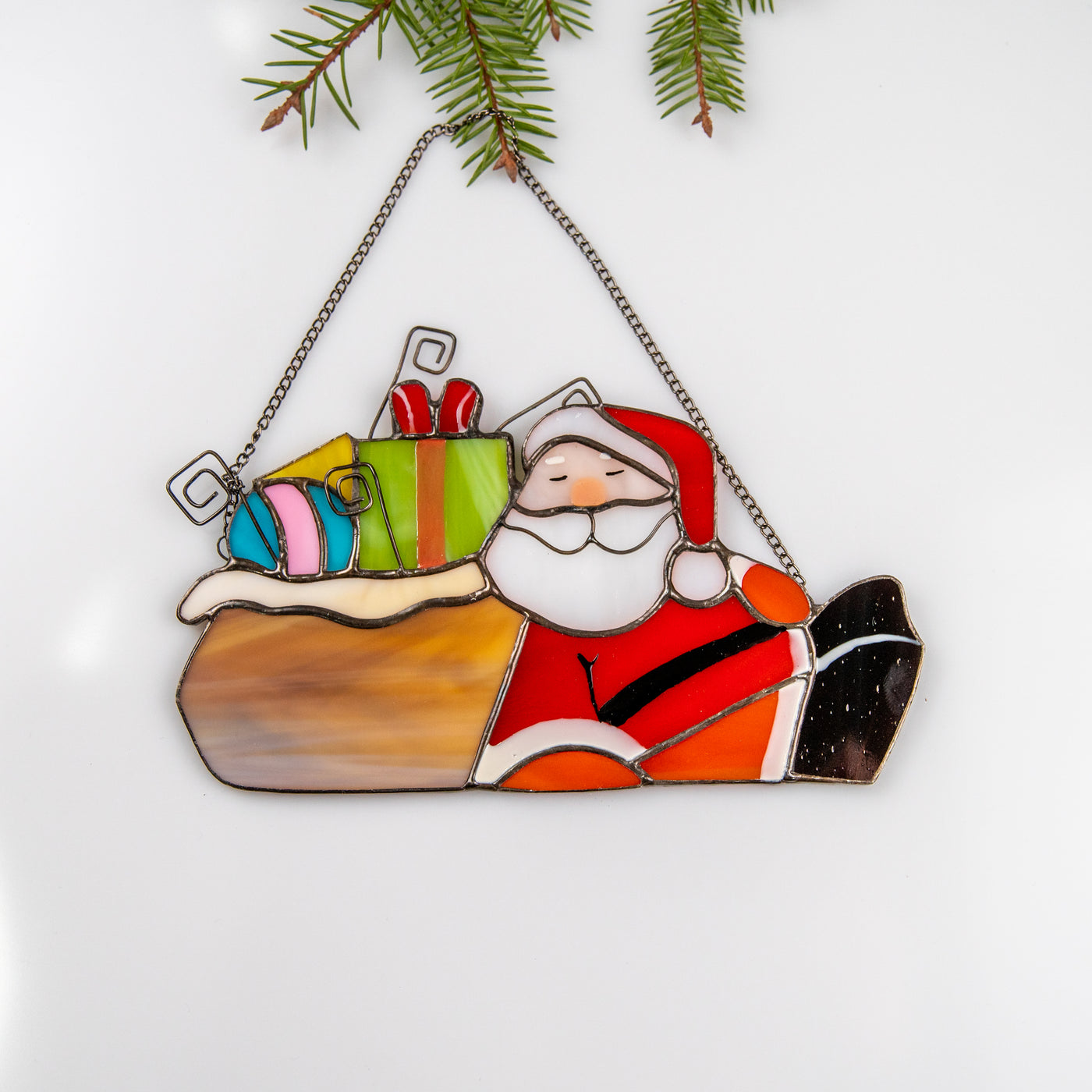 Santa with the gift stained glass window hanging for Christmas