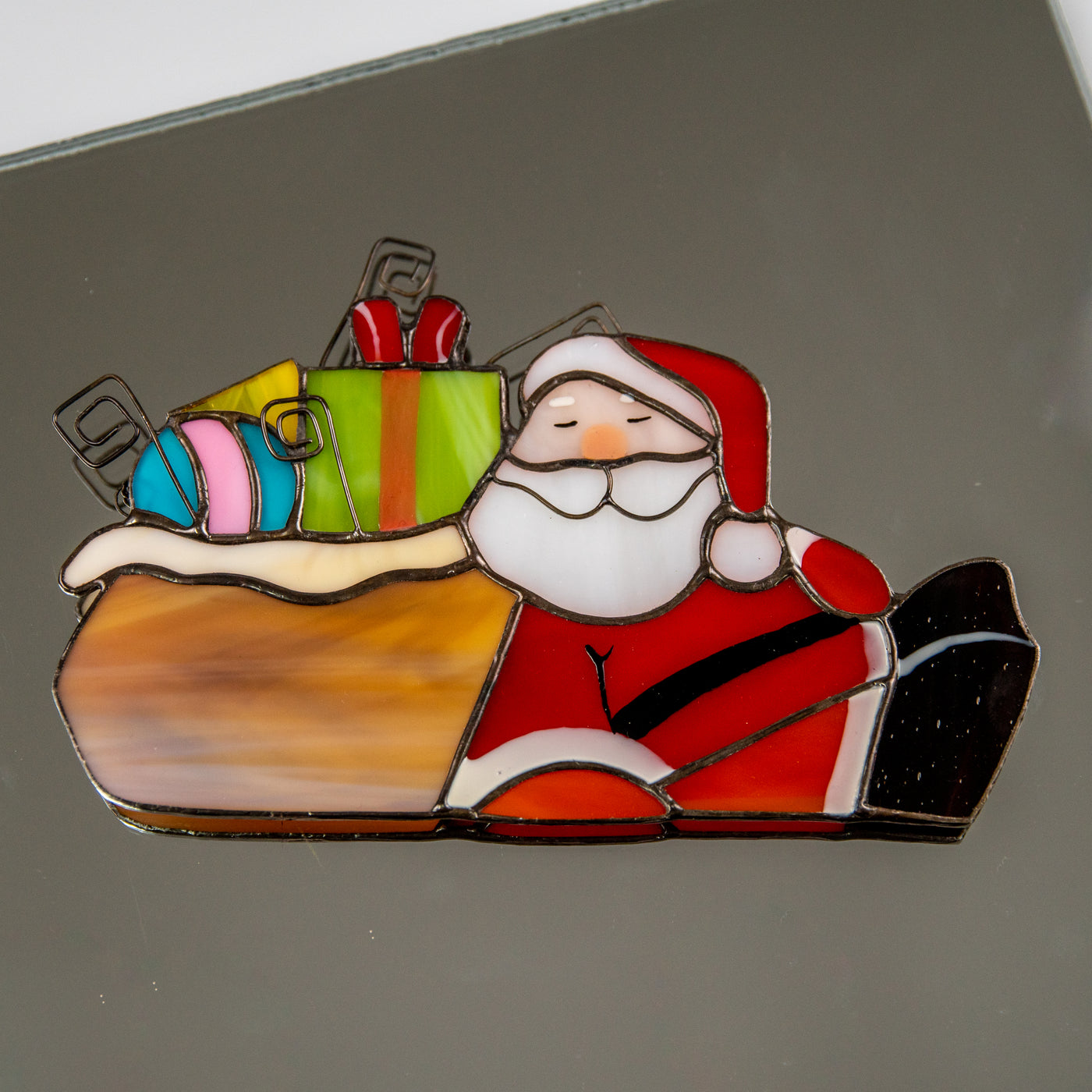 Santa with the gifts suncatcher of stained glass for Christmas window decor